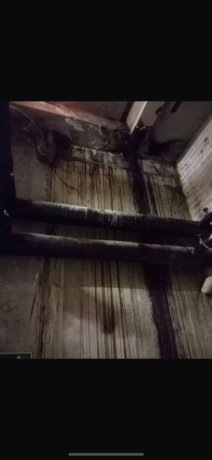 Cavern Walks car park wall before treatment, showing severe water ingress